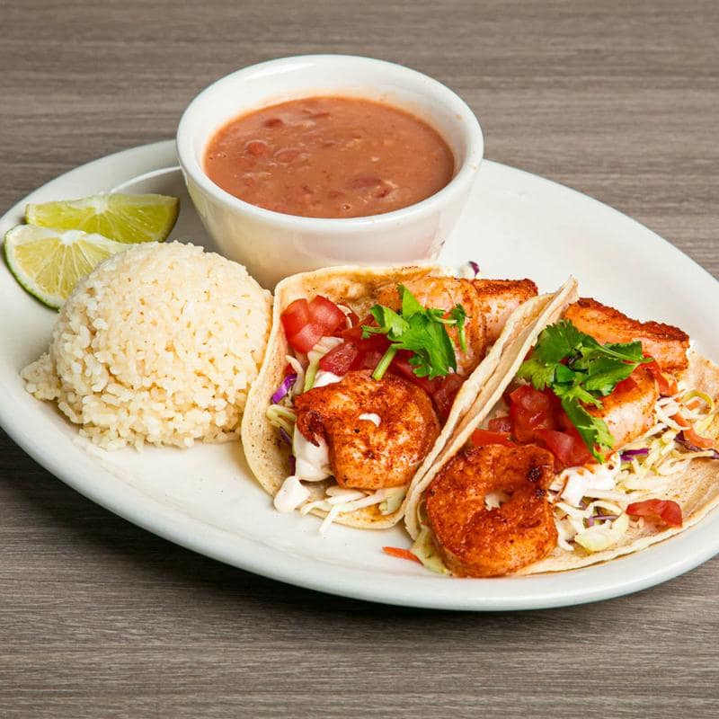 Battered fish tacos with fresh garnish