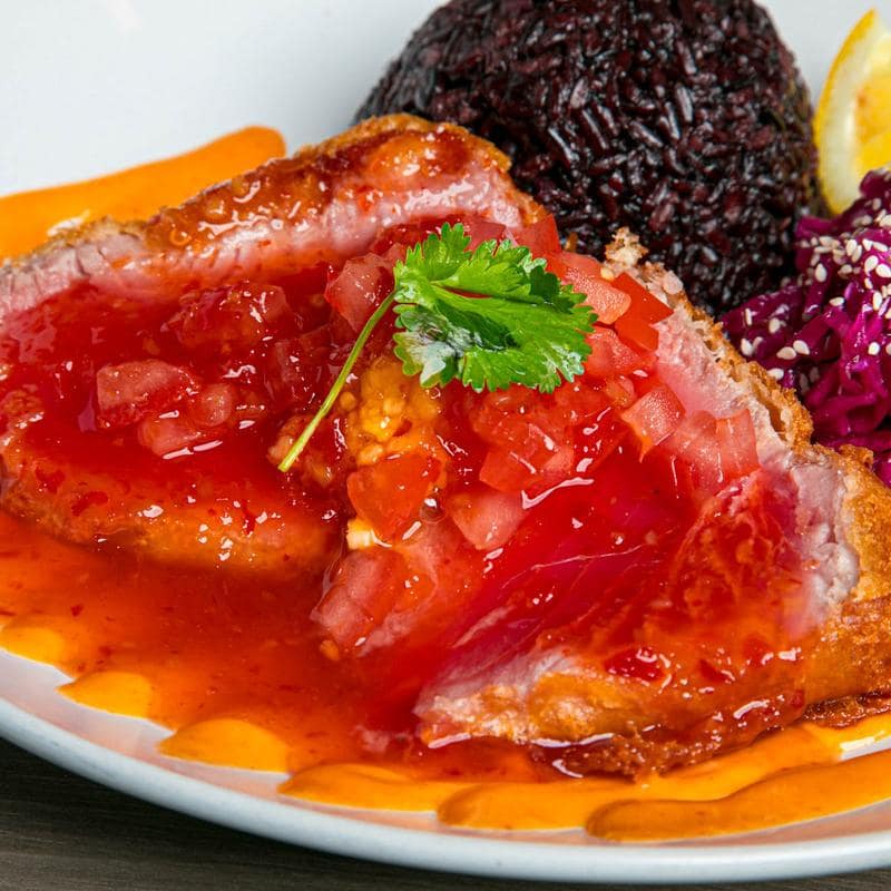 Grilled fish with fresh garnish