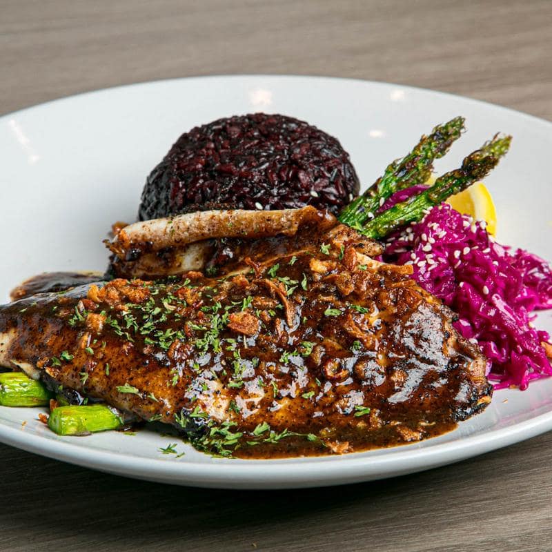 Barramundi with black pepper sauce and asparagus
